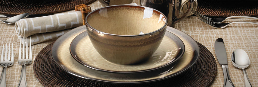 Anastasia Cream commands attention with an earthy cream body in a hammered, embossed pattern and a dark, gleaming rim.