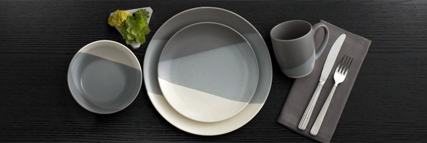 Brandi Gray dinnerware adds modern appeal to any meal with warm, earthy color tones delineated by cream and gray bands, and an overall speckle effect.